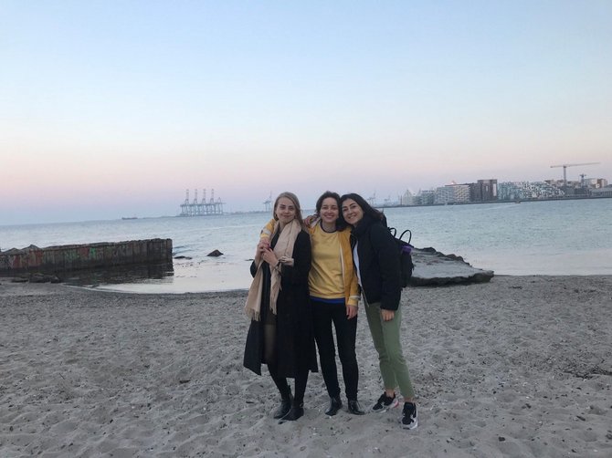 Eda and her friends at the beach near campus